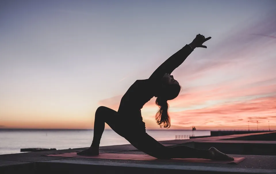 A member in a calm meditation pose during a re-test cycle