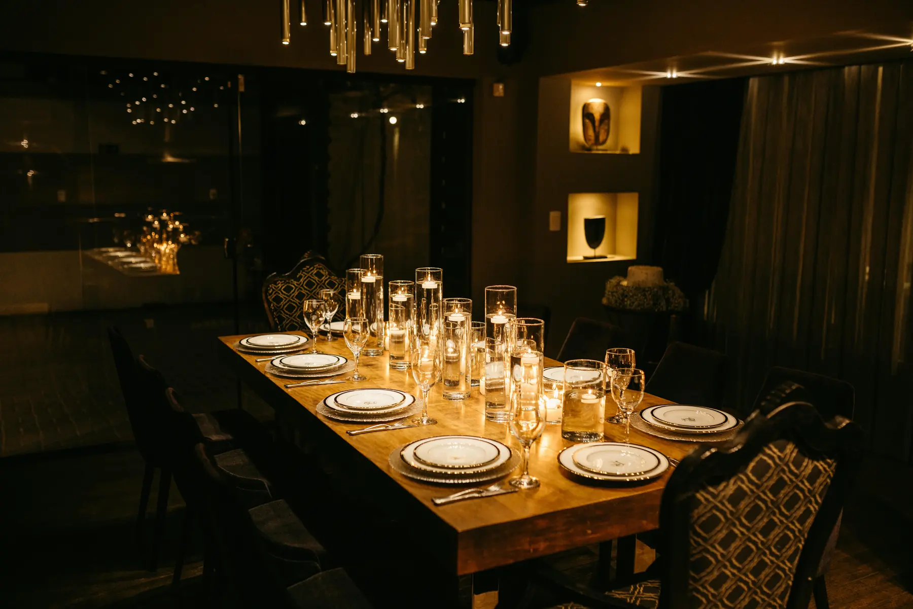 The main candlelit dining room at NOCTURNE