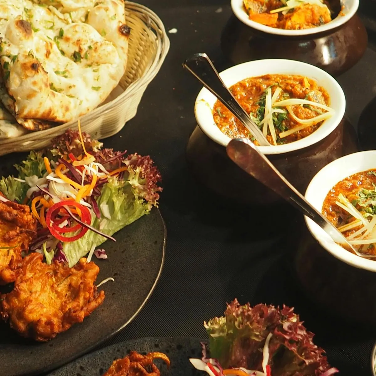 A signature course, plated and ready to serve under candlelight