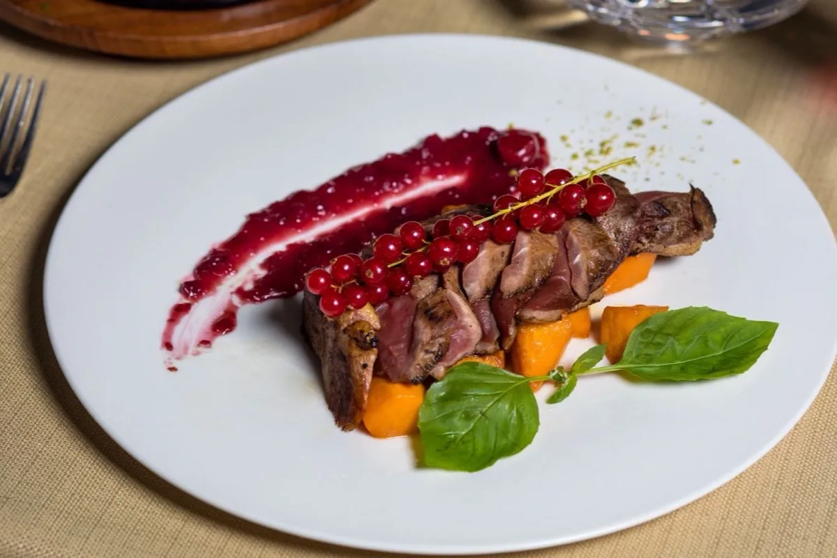 Aged duck breast with cherry and burnt onion jus