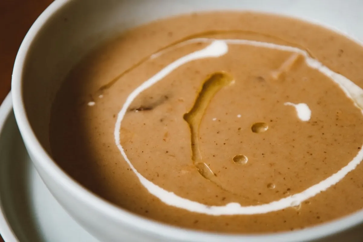 Wild mushroom consommé with herbs from the garden