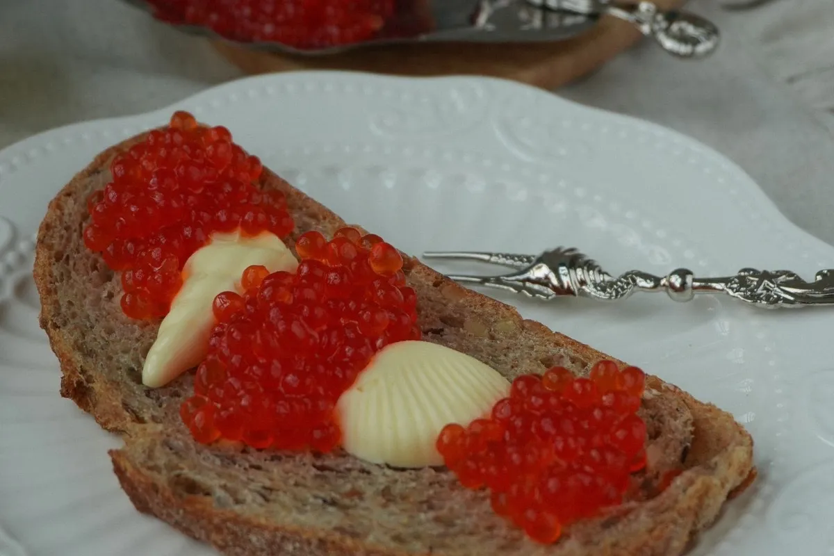Brioche with cultured butter and house-cured salmon roe
